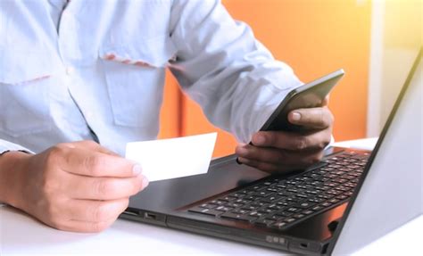 Premium Photo Midsection Of Businessman Working At Desk In Office