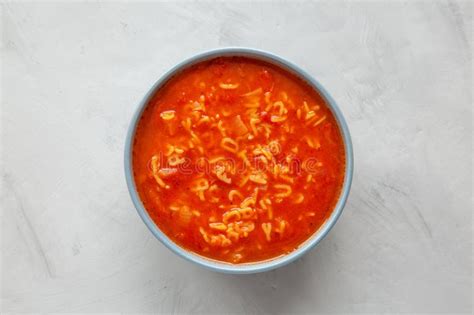 Homemade Alphabet Soup In Tomato Sauce In A Bowl Top View Overhead