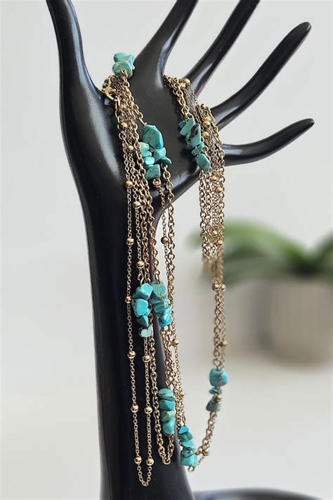 S Long Gold Tone Chain With Faux Turquoise Chips Gem