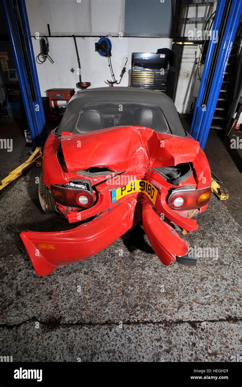 Car Wreck Crash Damaged Mk1 Mazda MX5 With The Rear Bumper Folded