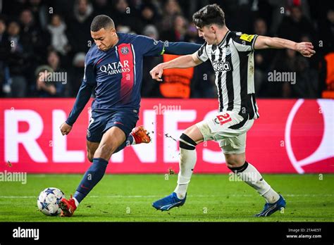 Paris France 28th Nov 2023 Kylian Mbappe Of Psg And Tino Livramento Of Newcastle During The