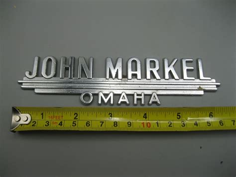 Vintage Metal Dealer Dealership Badge Emblem John Markel Omaha