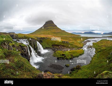 Kirkjufellsfoss Waterfall And Kirkjufell Mountain Iceland Stock Photo