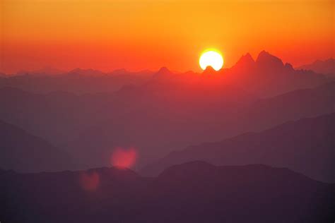 The Sun Sets Behind The Coast Mountain Photograph By Christopher Kimmel