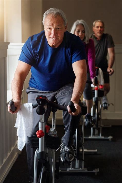 Fitness Dumbbell And Mature Man At A Gym For Wellness Training And