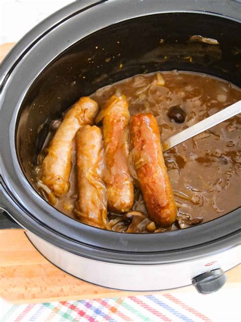 Sausages In Onion Gravy Slow Cooker Recipe Tastefully Vikkie