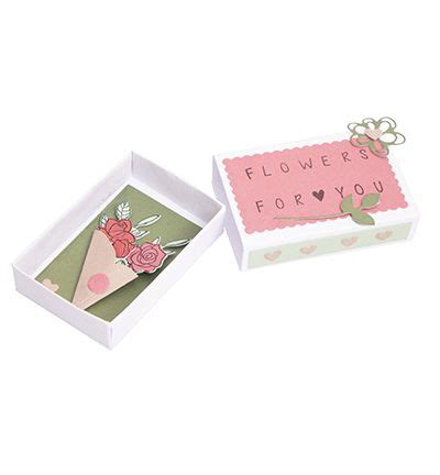 An Open Box With Flowers On It And A Card Inside That Says Flower Is