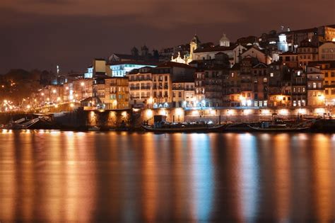 Premium Photo | Old town of porto at night, portugal.