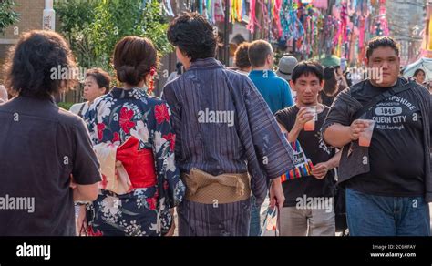 Visitors Walking In A Hot Summers Day At Shitamachi Tanabata Matsuri