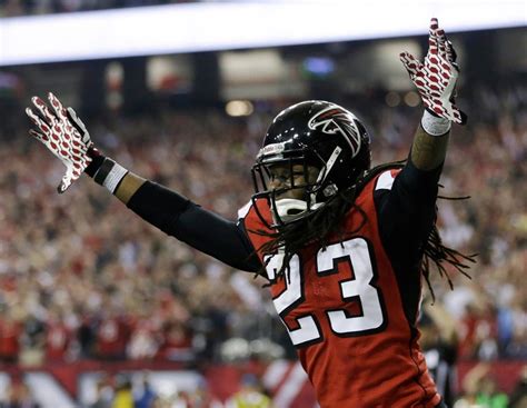 Atlanta Falcons Dunta Robinson Celebrates After Stripping The Ball