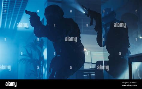 Black swat team uniform hi-res stock photography and images - Alamy