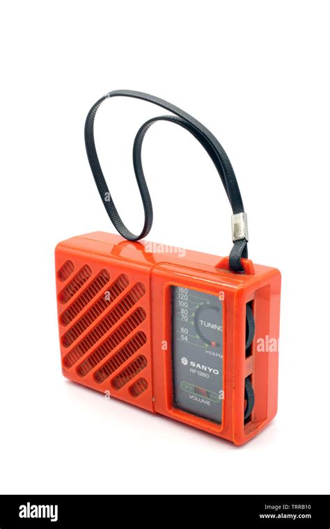 Vintage Orange Sanyo Plastic Portable Transistor Radio Isolated On A