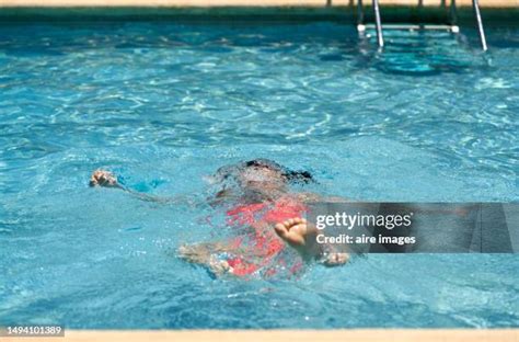 Kids In Swimming Pool Silhouette Photos And Premium High Res Pictures