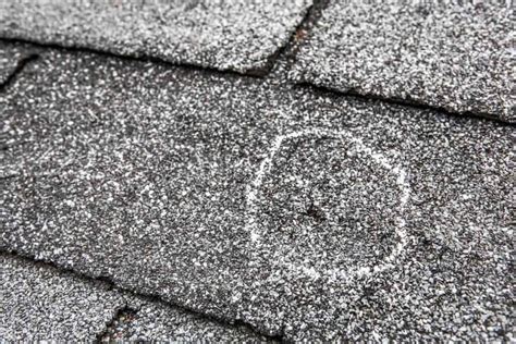What Does Hail Damage Look Like on a Roof? | RoofClaim