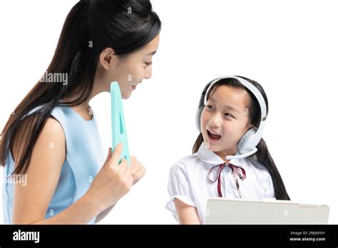 A Young Female Teacher Counseling Students Learning Stock Photo Alamy