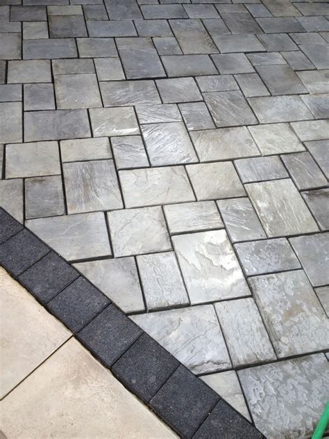 Beautiful Patio Using Unilock Brick Pavers Stonehenge Coping Series