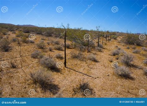 Rustic Barbed Wire Fence stock photo. Image of posts - 41284730