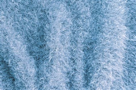 Background Of Soft Fluffy Knit Fabric Blue Knitted Texture Stock