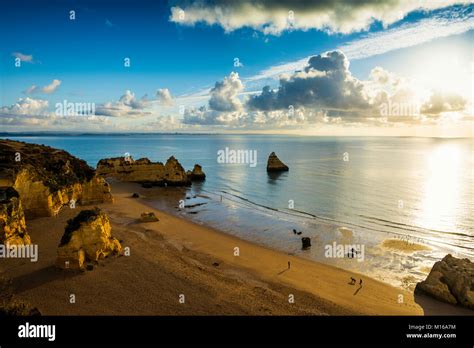 Coloured Cliffs And Sunrise At The Beach Praia Da Dona Ana Lagos