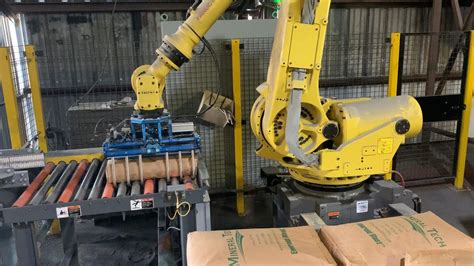 Robotic Arm Palletizer Stacks Lb Bags Youtube