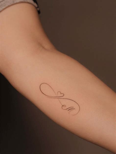 55 Meaningful Fine Line Tattoos For Minimalist Women Tattoo Designs For