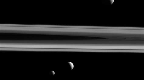 Cassini Image Of Saturns Rings With Mimas Janus And Tethys