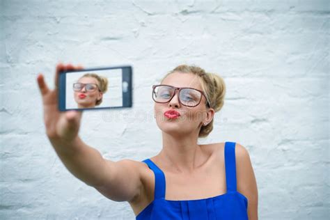 Pretty Girl In Glasses Sending Air Kiss And Making Stock Image Image