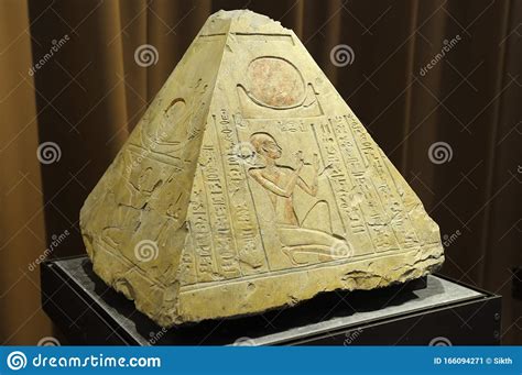 Pyramidion, The Top Of The Funerary Pyramid With The Image Of The Sun, A Male Figure And ...