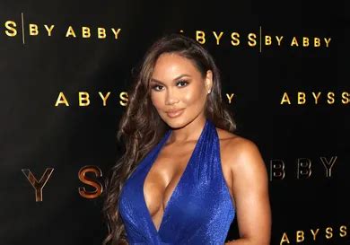 Daphne Joy Models Bright Red Bikini Amid Diddy 50 Cent Drama