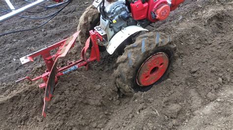 Honda F Tiller With Plough Youtube