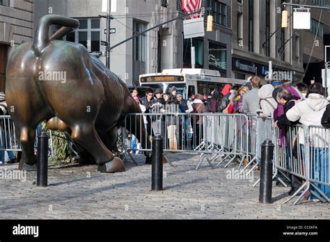 Tourists Wait Behind Police Barricades To Pose For Photos In Front Of