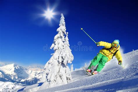 Skier Skiing Downhill In High Mountains Stock Photo Image Of