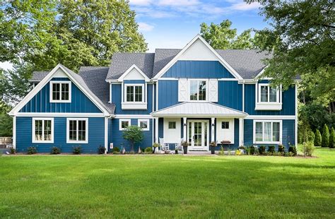 Modern Farmhouse with Blue Exterior - Home Bunch Interior Design Ideas