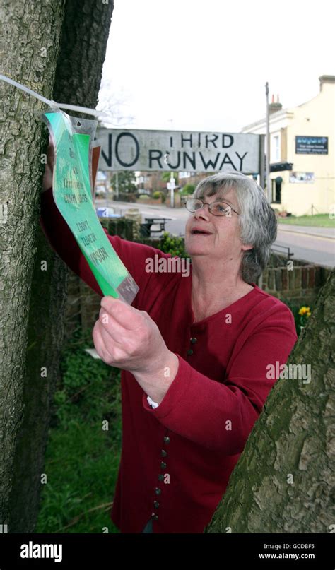 Resident Lynne Davies Takes Down Her No Third Runway Signs In The