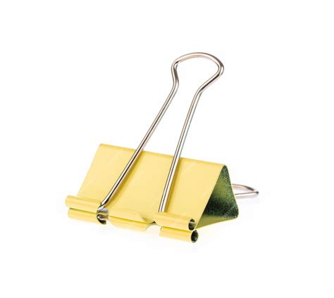 Premium Photo Yellow Binder Clips Isolated On White Background