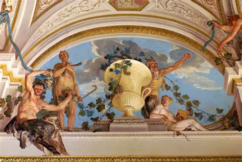 The Painting On The Ceiling Is Depicting Men And Vases