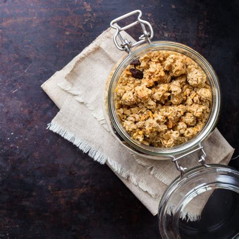 Homemade Muesli Granola In A Jar On Rusty Black Table Stock Photo