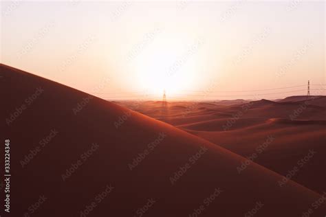 Bright sunrise on the red sand dunes of the Arabian desert in Riyadh ...