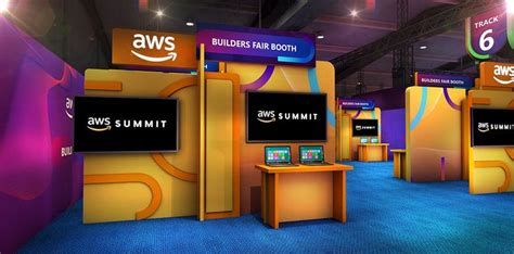 An Exhibit Booth With Multiple Displays For The Aws Summit