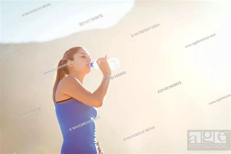 Beautiful Fit Brunette Drinking Water Stock Photo Picture And Low