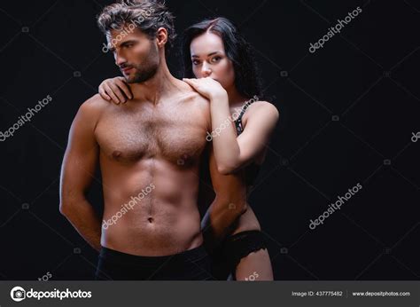 Sensual Brunette Woman Embracing Shoulders Man Muscular Torso While