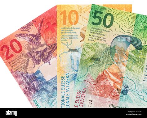 Banknotes of 10, 20 and 50 Swiss francs on white background Stock Photo ...