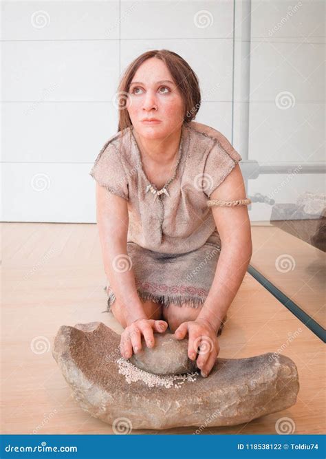 Realistic Statue Of A Prehistoric Woman In The Museum Of Science