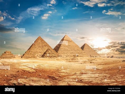 Egyptian Pyramids In Sand Desert And Clear Sky Hi Res Stock Photography