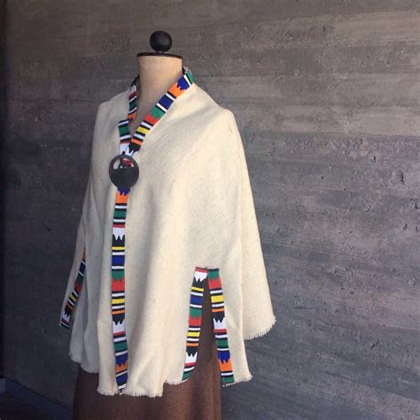 Poncho a telar en lana de oveja y diseños Fashion Coat Women