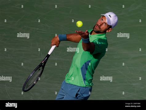 March Novak Djokovic Of Serbia Serves Against Aleksandar Vukic