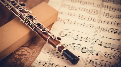 Premium Photo | A photo of a wooden recorder on a vintage sheet music