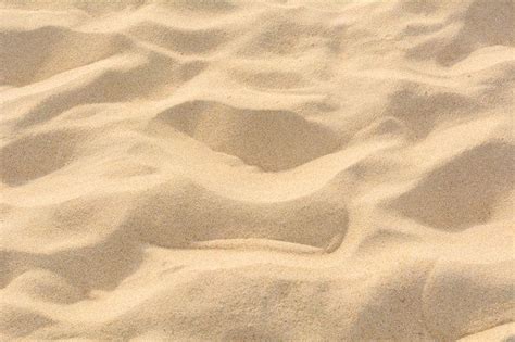 Textura Da Areia Na Praia Como O Fundo Foto Premium Arquelina E