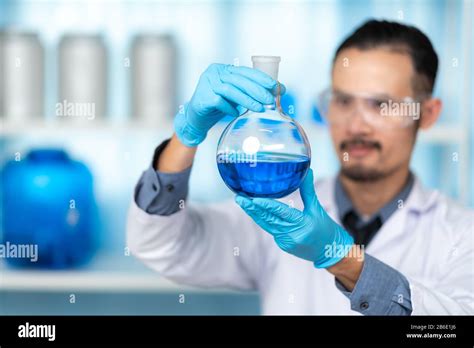 In A Modern Laboratory Research Scientist Conducts Experiments By