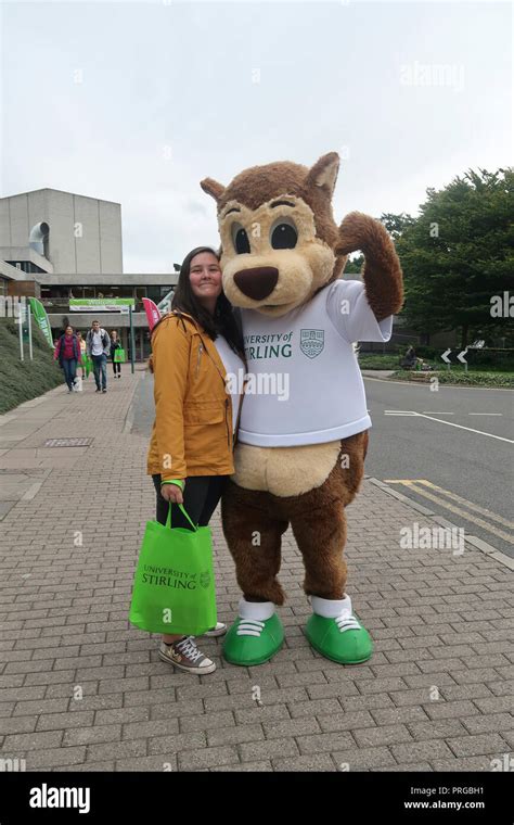 Prospective student with Stirling University mascot at open day Stock Photo - Alamy